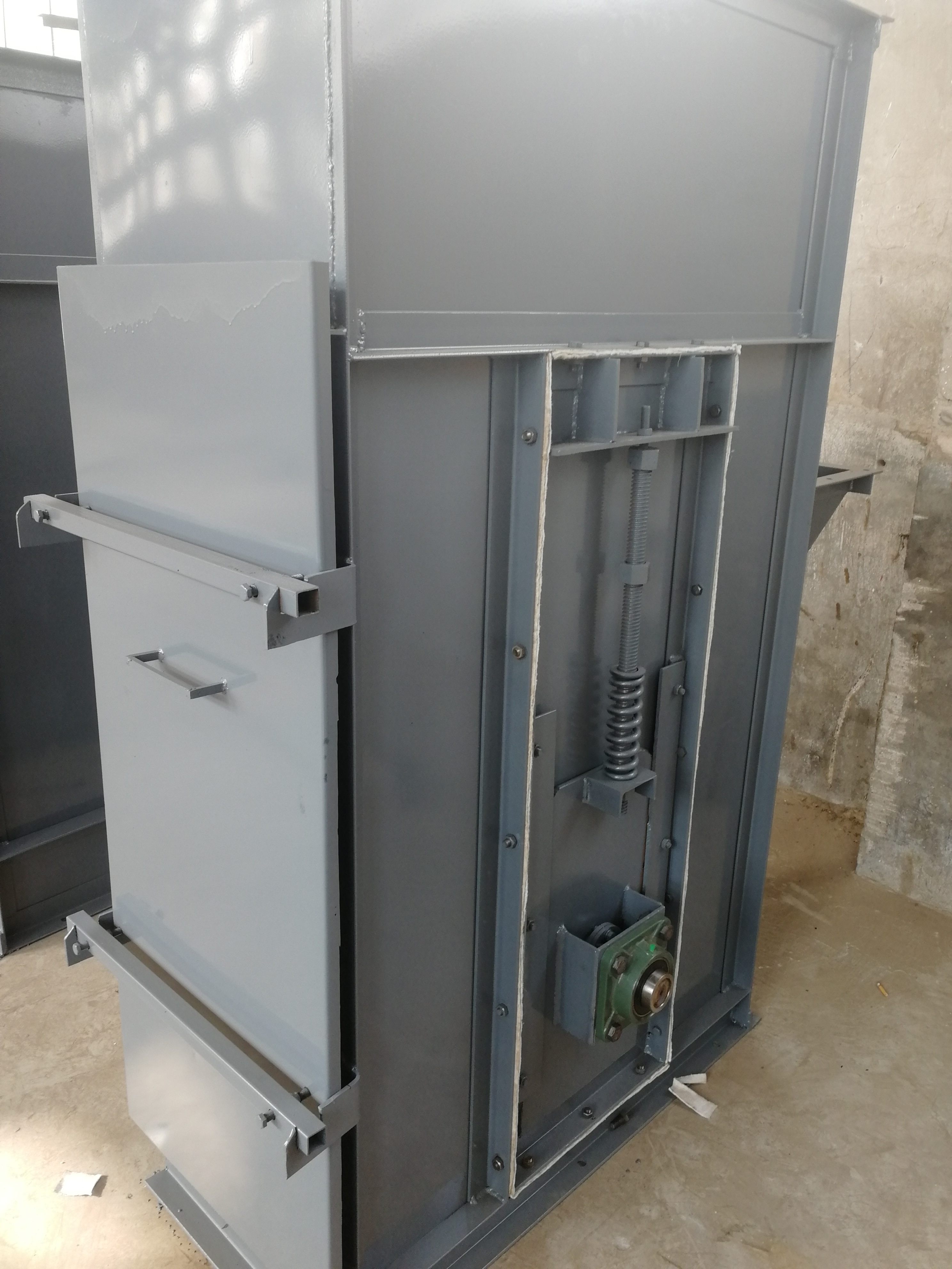 斗式提升機及其功能有哪些?(斗提機斗式提升機)